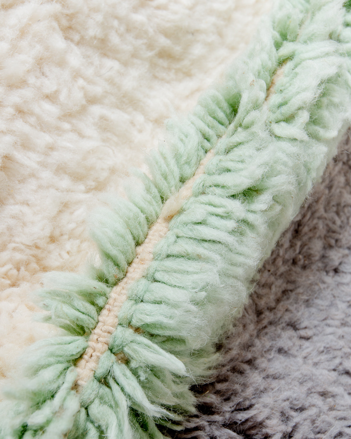 Modern, designer, handcrafted Berber rug from Morocco. Beniourain carpet with beautiful colours and patterns and fluffy wool texture.